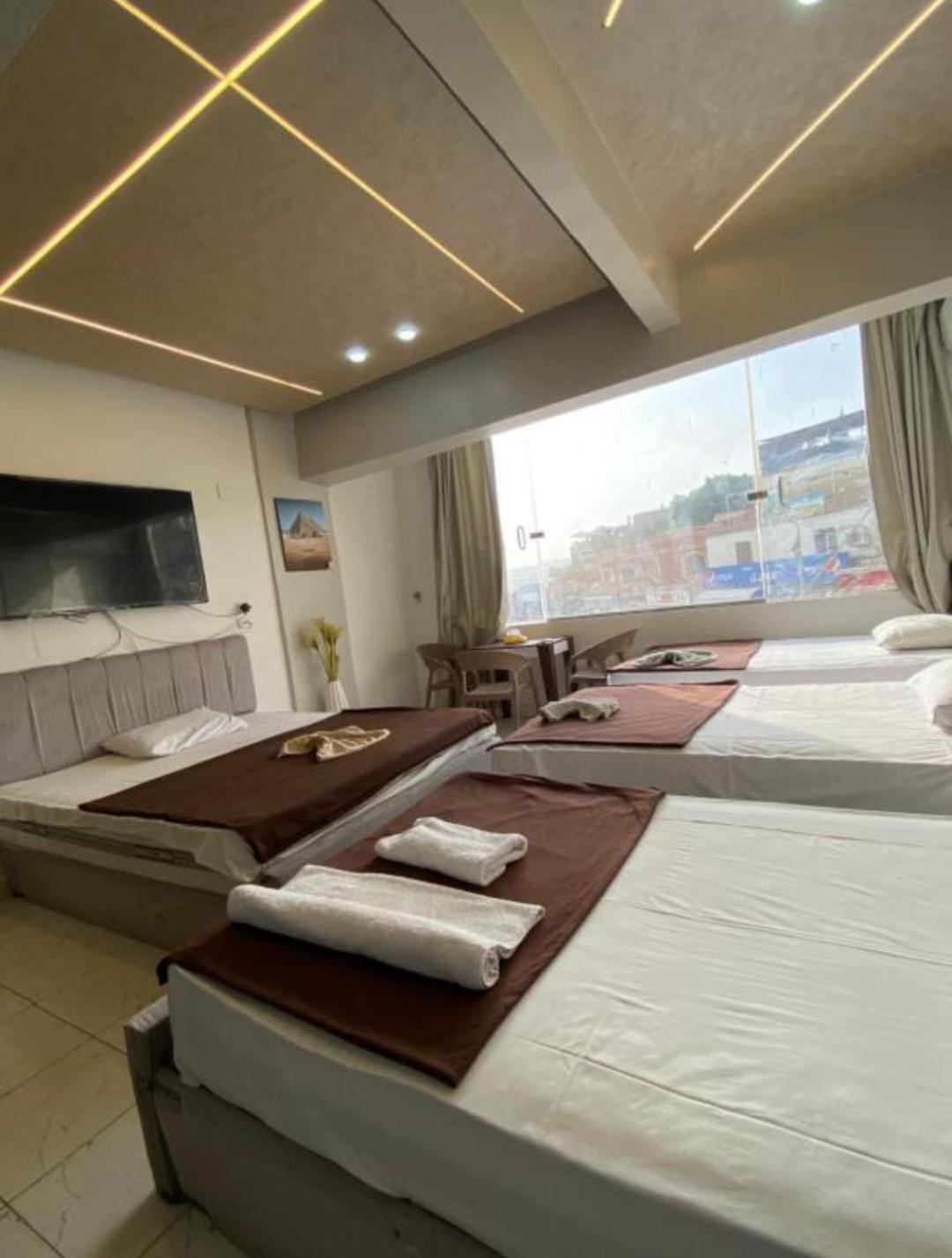 Pyramids Family Inn Kafret el-Gabal Esterno foto